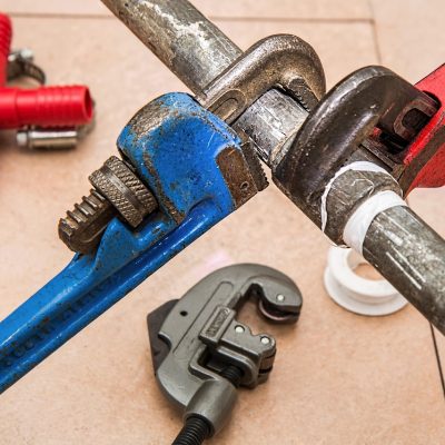 Plumbing wrenches in use by RNM Services during home reno